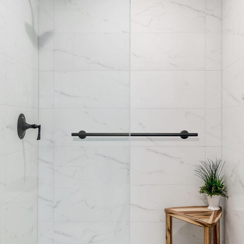 Modern Spa Shower Lifestyle Image. White and gray marble tile sh