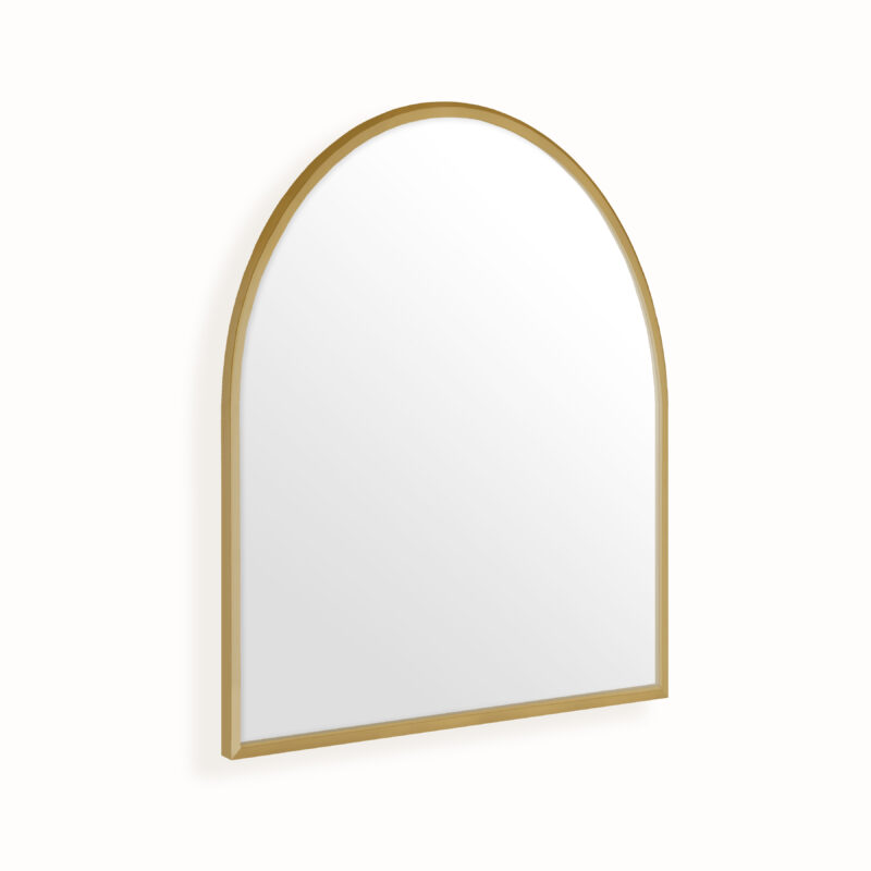 Brushed bronze mirror with arch shape on white wall